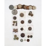 Group of Coins held within a small plastic container, containing a group of lower grade coins from