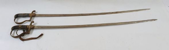 Two WWII German Officer's swords, one stamped 'Eickhorn Solingen' with squirrel logo