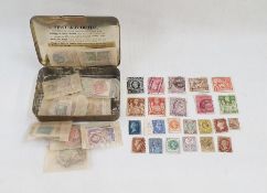 GB: Tin of 12 small stamp packets full of QV-KGVI mint and used: defin., commem., officials and