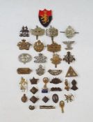 Collection of British and Commonwealth military badges and cap badges.  Army cyclist corps,