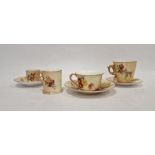 Royal Worcester porcelain cabinet cup and saucer, the blush ground floral spray painted, three other