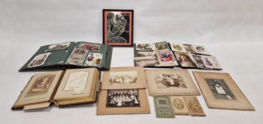 Two vintage postcard albums containing postcards from the 19th and 20th centuries, a Victorian