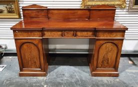 19th century mahogany pedestal sideboard with architectural style raised ledge back, three frieze