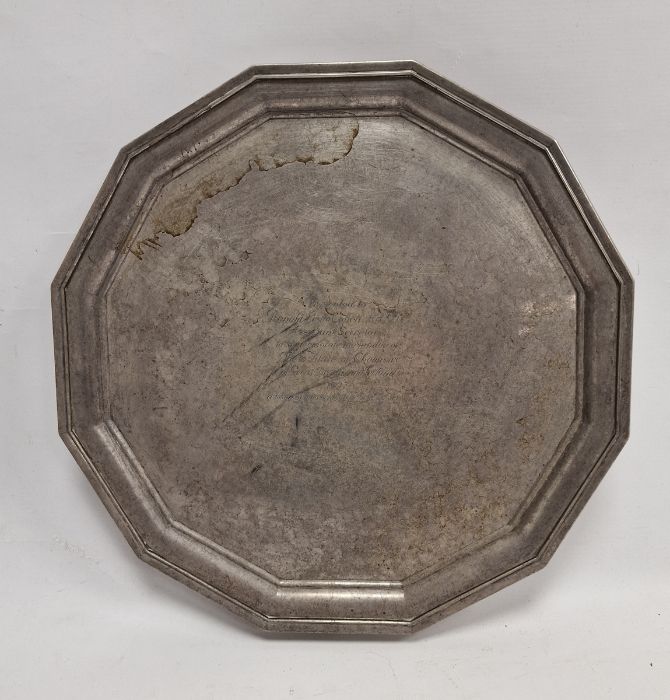 George V silver waiter of dodecagon form, raised on four feet, with inscription 'Presented to Ronald
