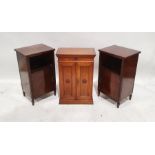 Edwardian mahogany two-door cabinet with carved floral motif, the doors opening to reveal shelves