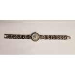 Rotary silver-cased lady's wristwatch, with mother-of-pearl dial, Roman numerals, on a silver link