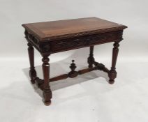 Victorian Gothic-revival oak single drawer side table, the rectangular top with carved and moulded