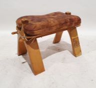 Leather-topped camel stool