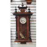 Small Vienna regulator-type clock in carved decorated case, the white enamel dial with Arabic