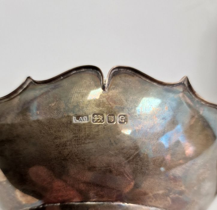 Silver bowl raised on three feet, London assay office mark and four boxed silver salts raised on - Image 3 of 4