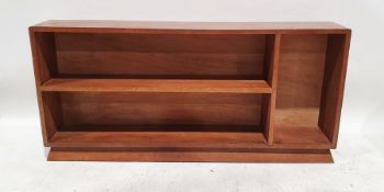 Mid-century modern teak low open bookcase with two shelves and open recess to the right hand side,