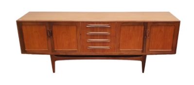 20th century teak G-Plan Fresco sideboard with a nest of four short drawers flanked by cupboards