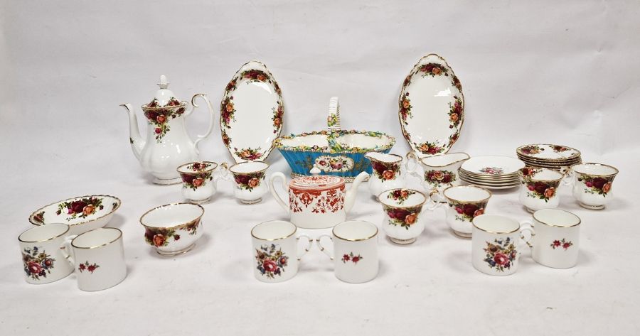 Set of six Royal Worcester china coffee cans and saucers, floral decorated, a Royal Albert 'Old