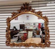 Modern Victorian-style arched top overmantel mirror with shaped glass