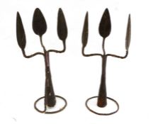 Pair of African metalwares, in the form of a triple-headed spearhead, featuring sections of