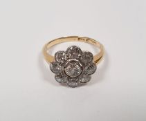 18ct gold and diamond flowerhead cluster ring, circa 1920's, the central stone approximately 0.4ct