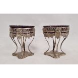Pair of continental silver-coloured footed pedestal dishes and glass liners, each engraved