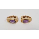 Pair of 18k yellow gold earrings set with amethysts, approx. 25g gross