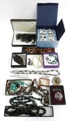 Two boxes of assorted costume jewellery to include rings, pendants, bangles, necklaces, brooches,