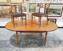 Mid-century modern G-Plan teak extending dining table, the D-ends on turned and tapering supports