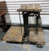 Set of vintage cast iron and wood potato scales marked 'John Wilder Ltd of Reading', on wheels