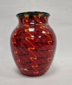 Modern Poole pottery vase with everted rim, ovoid body, the red ground decorated with black and