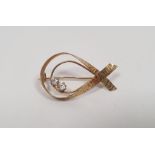 9ct gold and white stone brooch, loop ribbon pattern