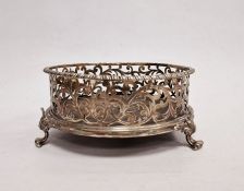 Victorian silver and mahogany coaster on three scroll feet, marks rubbed, 15cm diameter