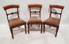 Three 19th century mahogany chairs with drop-in seats, on turned and carved front legs (3)