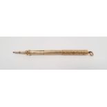 Gold-coloured propelling pencil pendant by Sampson and Mordan, foliate scroll engraved, cylindrical