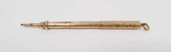 Gold-coloured propelling pencil pendant by Sampson and Mordan, foliate scroll engraved, cylindrical