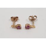 Pair of 9ct gold and ruby earrings, approx. 1.0g total