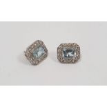 Pair of 18ct white gold stud earrings set with aquamarine and diamonds, stamped 750 Condition