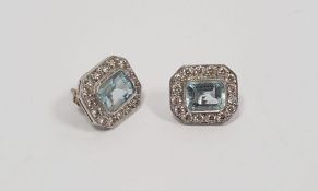 Pair of 18ct white gold stud earrings set with aquamarine and diamonds, stamped 750 Condition