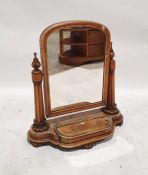 19th century walnut dressing table mirror with arched top, on column supports, platform base with