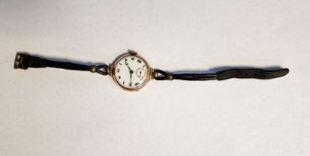 Lady's 9ct gold-cased wristwatch, the enamel dial with Roman numerals and subsidiary seconds hand,