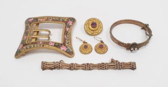 Yellow metal and enamel belt buckle, a brooch, two yellow metal earrings set with amethyst