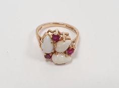 9ct yellow gold ring set with three rubies and three opals, stamped 9ct Condition ReportSize M