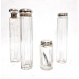 Four various cut glass and silver-topped toilet jars (4)