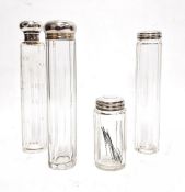 Four various cut glass and silver-topped toilet jars (4)