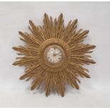 Mid 20th century sunburst wall clock with Roman numerals on a dial marked 'Smiths 8-day', 49cm
