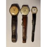 Lady's gold-plated Longines wristwatch, the enamel dial with Roman numerals, with leather strap,