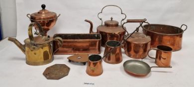 Copper samovar, two copper kettles, a brass watering can, copper saucepans, a copper fish bath and