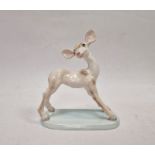 Wedgwood & Co early 20th century handpainted pottery fawn, on pale blue oval base, 15.5cm high