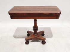 Victorian rosewood tea table, the rectangular fold-out top with rounded front corners, on turned