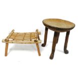 Three African stools,one beaded animal decoration to the seat, one with reeded seat and one