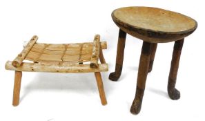 Three African stools,one beaded animal decoration to the seat, one with reeded seat and one