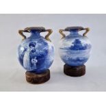 Pair Royal Doulton pottery blue and white Children's Series vases, each with everted rim,