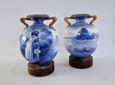 Pair Royal Doulton pottery blue and white Children's Series vases, each with everted rim,