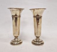 Pair of 20th century silver weighted vases of circular turned tapering form, Birmingham, 15.5cm high